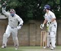 Simon Smith takes a catch behind the wicket to dismiss Craig Wallace.jpg